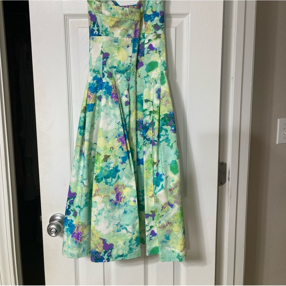 Floral summer dress with crisscross back.